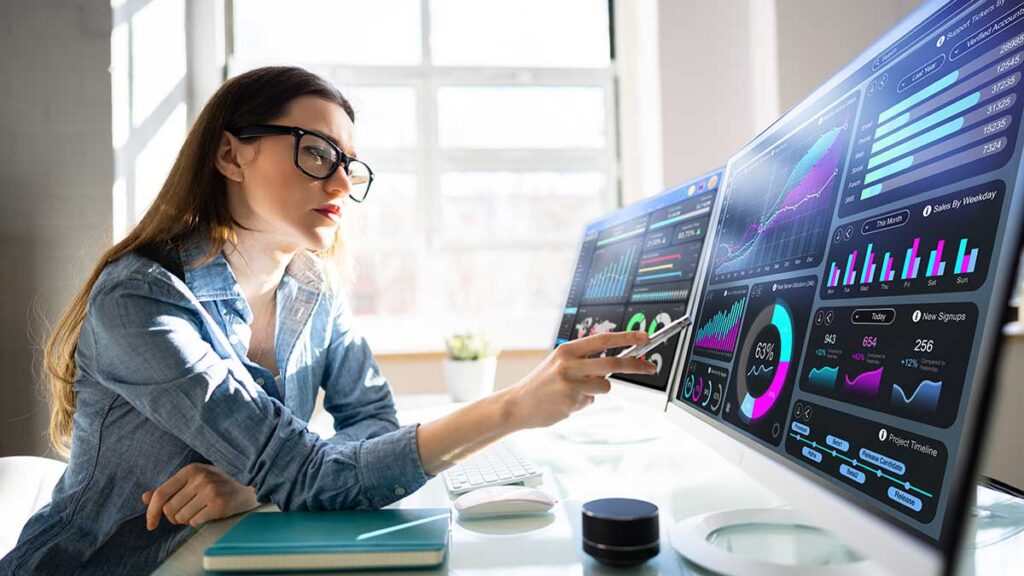 Woman Glasses Pointing Computer Monitor Dashboard